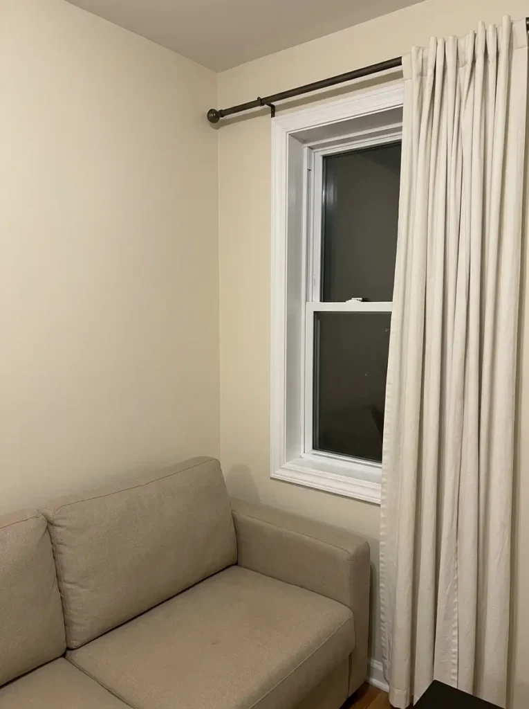 Use Curtains to Make the Room Feel Taller